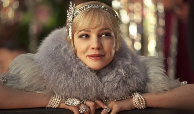 This film publicity image released by Warner Bros. Pictures shows Carey Mulligan as Daisy Buchanan in a scene from "The Great Gatsby." (AP Photo/Warner Bros. Pictures, Matt Hart)