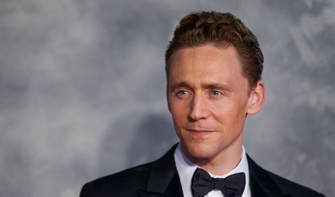 British actor Tom Hiddleston attends the world film premiere of 'Thor, The Dark World' in central London on October 22, 2013. AFP PHOTO/ANDREW COWIE (Photo credit should read ANDREW COWIE/AFP/Getty Images)