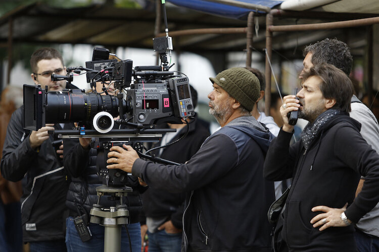 Writer/director LUC BESSON with his crew on the set of ?Lucy?, an action-thriller that examines the possibility of what one human could truly do if she unlocked 100 percent of her brain capacity and accessed the furthest reaches of her mind.